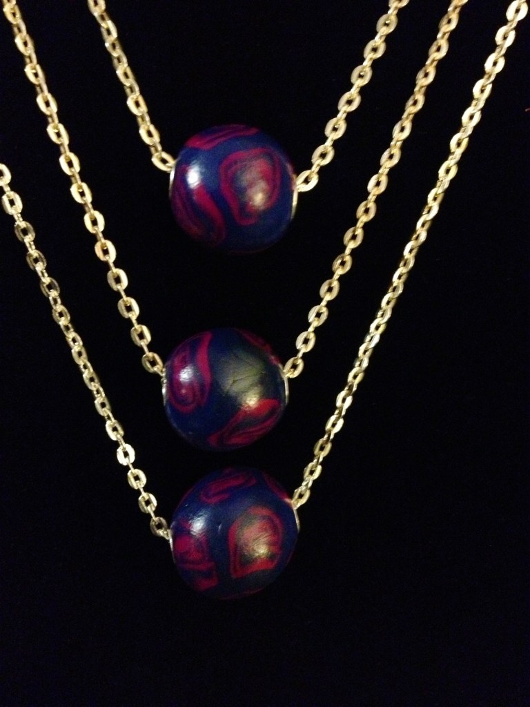 Polymer clay beads with rose designs