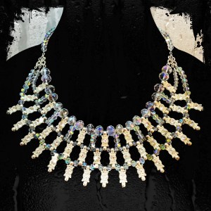 Silver link and crystal bibstyle necklace.  18